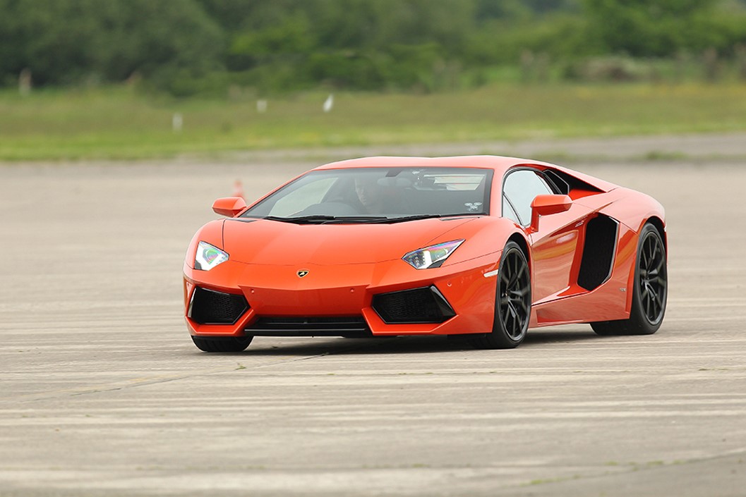 Ultimate Lamborghini Driving Experience for One with Free High Speed Ride